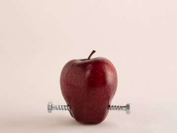 apple with two bolts in it